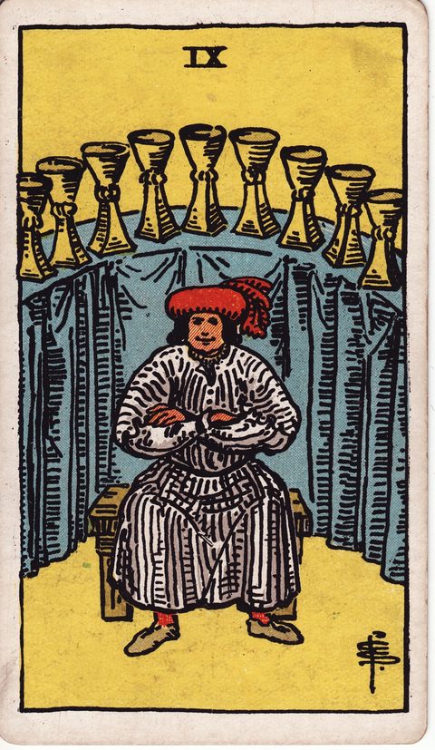 カップの9(Nine of Cups)のカード画像。ライダー版タロット